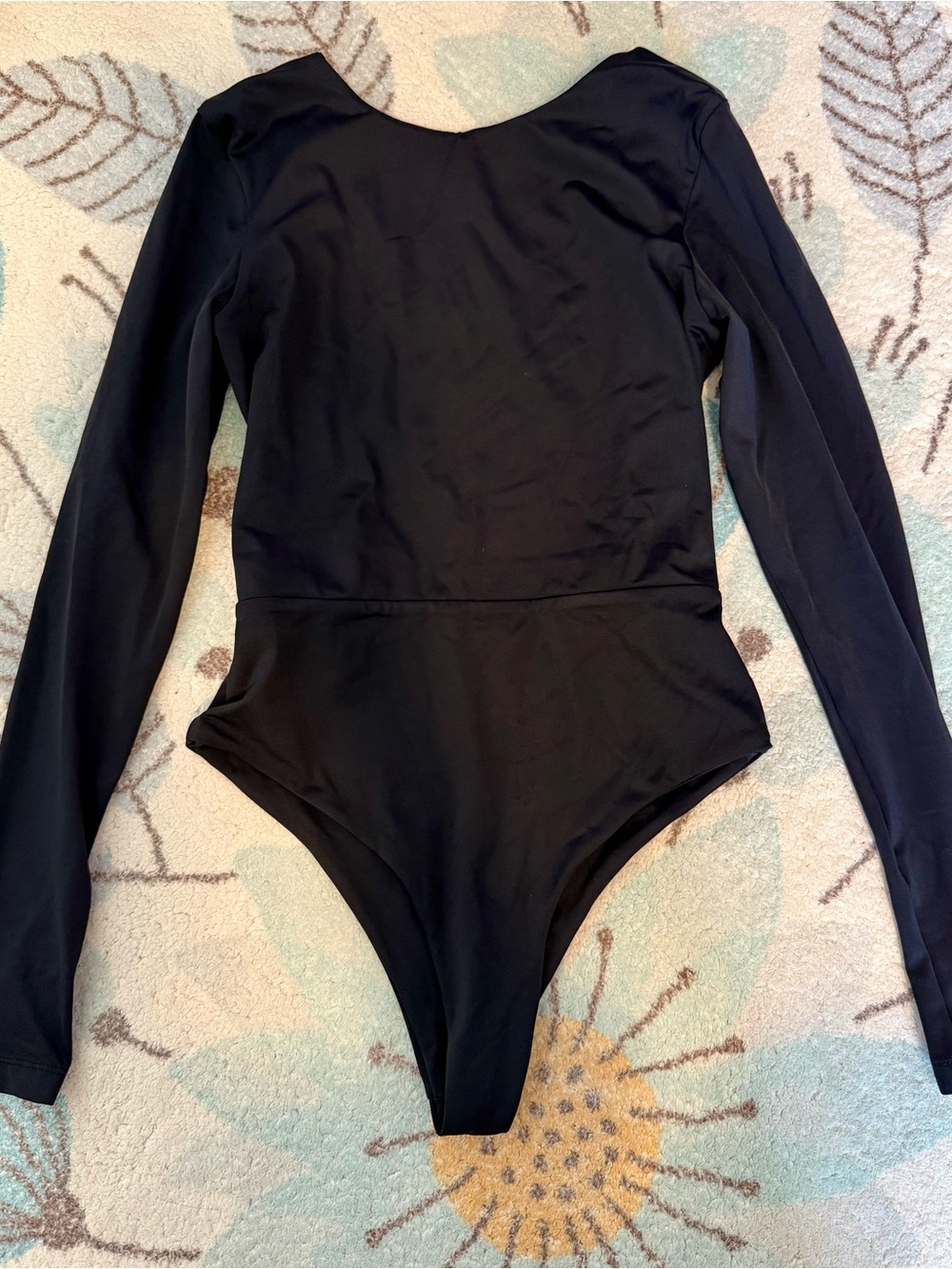 Solsea Black Long-Sleeve Thong One-Piece Swimsuit